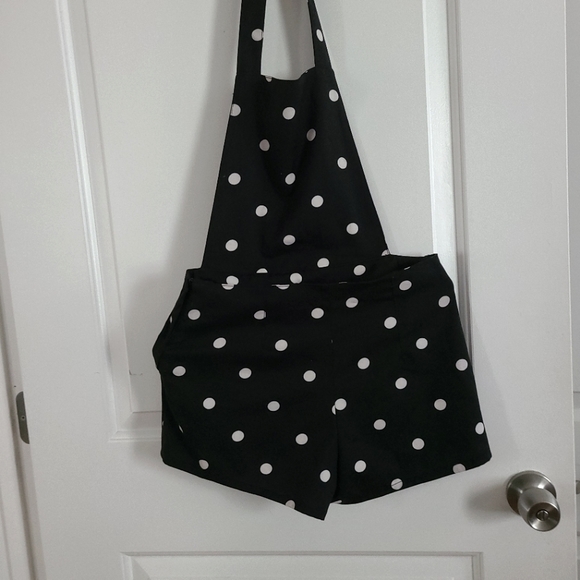 Black polka dot romper. - Picture 1 of 2